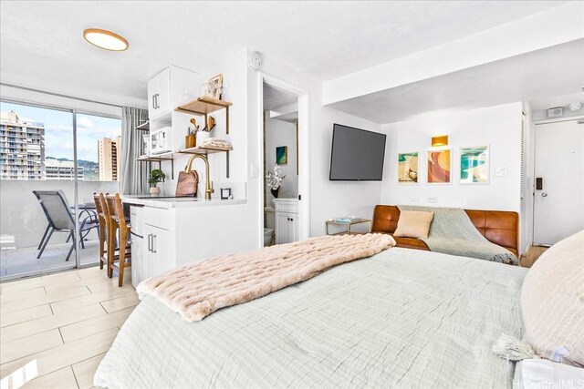 2463 Kuhio Ave Unit 1109, Honolulu, HI 96815 - bedroom with access to outside and a city view