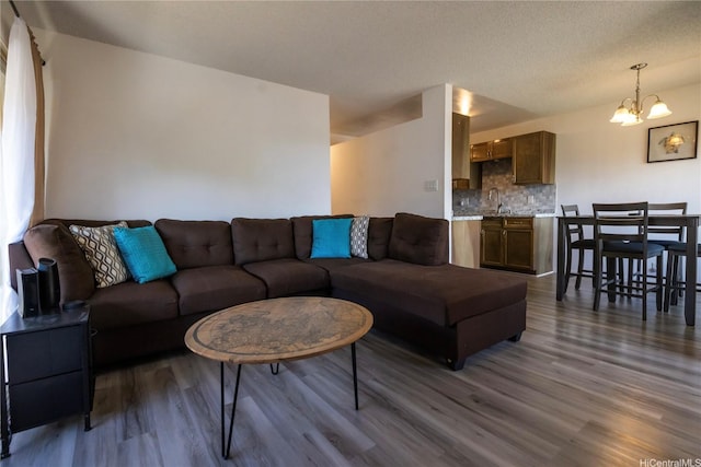 94-1147 Mopua Loop Unit K8, Waipahu, HI 96797 - living area with a chandelier and dark wood finished floors