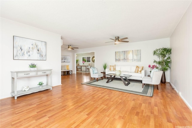 1433 Akanahe Pl, Kailua, HI 96734 - living room featuring light wood finished floors and a ceiling fan