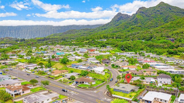 1433 Akanahe Pl, Kailua, HI 96734 - aerial view of residential area featuring a heavily wooded area and a mountain backdrop