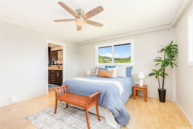 1433 Akanahe Pl, Kailua, HI 96734 - bedroom featuring light wood-type flooring, ensuite bath, and a ceiling fan