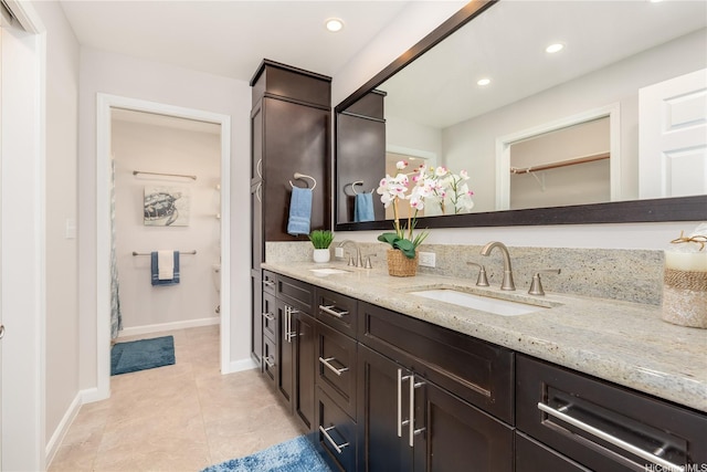 1433 Akanahe Pl, Kailua, HI 96734 - full bathroom featuring double vanity, recessed lighting, tile patterned floors, baseboards, and a closet