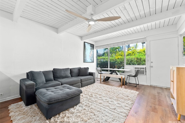 4130 Keanu St Unit 4, Honolulu, HI 96816 - living area with wood finished floors, ceiling fan, concrete block wall, and a wooden ceiling with exposed beams