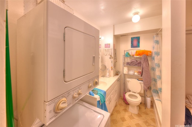 2345 Ala Wai Blvd Unit 2210, Honolulu, HI 96815 - bathroom with stacked washer / drying machine and vanity