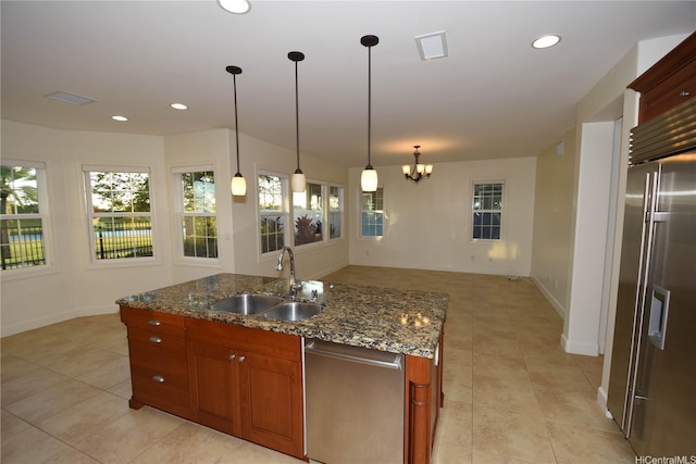 91-1342 Kaiokia St, Ewa Beach, HI 96706 - kitchen featuring appliances with stainless steel finishes, light tile patterned floors, a chandelier, healthy amount of natural light, and recessed lighting