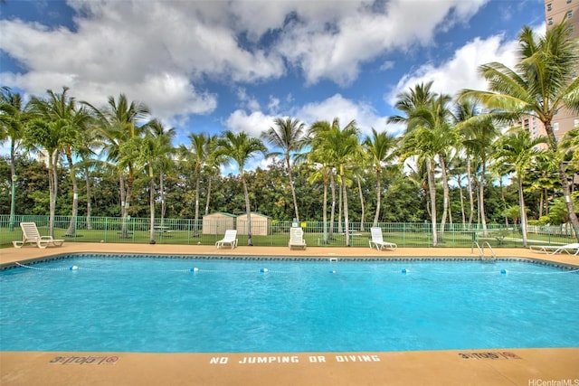 3009 Ala Makahala Pl Unit 214, Honolulu, HI 96818 - community pool featuring view of wooded area