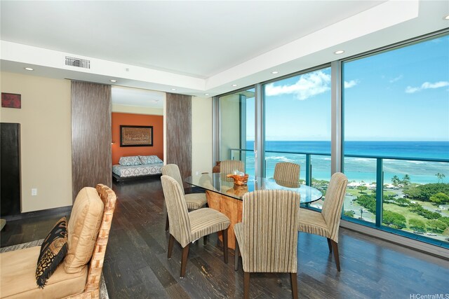 1288 Ala Moana Blvd Unit 18B, Honolulu, HI 96814 - dining area with wood finished floors, a water view, and recessed lighting