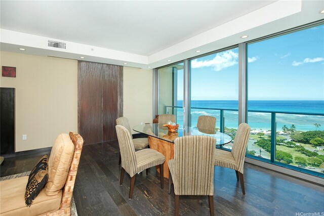 1288 Ala Moana Blvd Unit 18B, Honolulu, HI 96814 - dining area featuring wood finished floors, a water view, floor to ceiling windows, and recessed lighting
