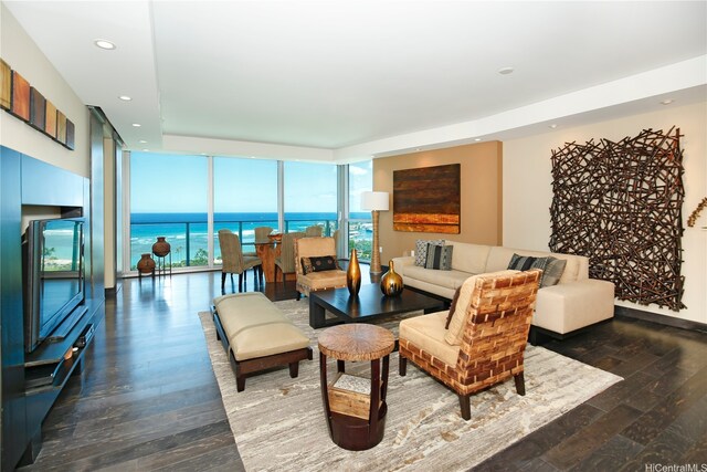 1288 Ala Moana Blvd Unit 18B, Honolulu, HI 96814 - living area featuring a wall of windows, dark wood-style flooring, and recessed lighting