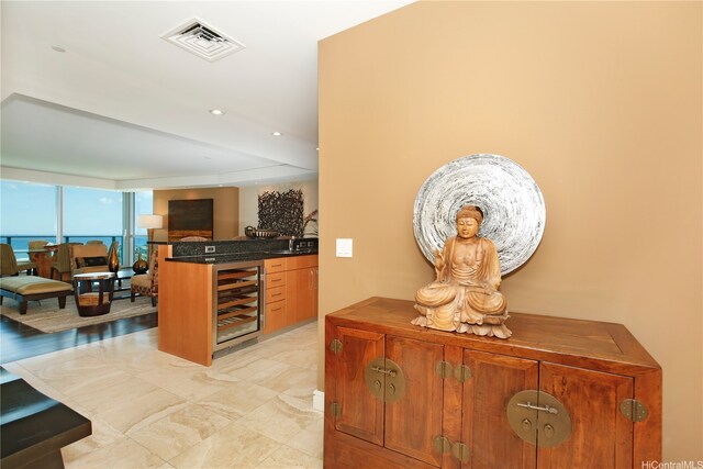 1288 Ala Moana Blvd Unit 18B, Honolulu, HI 96814 - kitchen featuring wine cooler, a peninsula, and open floor plan