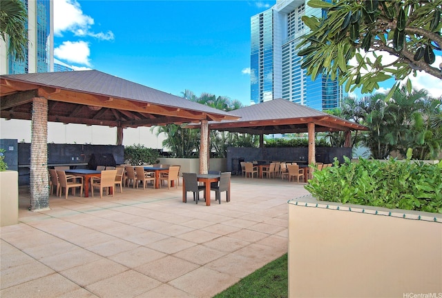 1288 Ala Moana Blvd Unit 18B, Honolulu, HI 96814 - view of patio / terrace with a gazebo and outdoor dining area