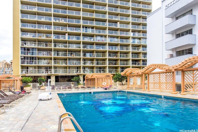 445 Seaside Ave Unit 1602, Honolulu, HI 96815 - community pool with a patio