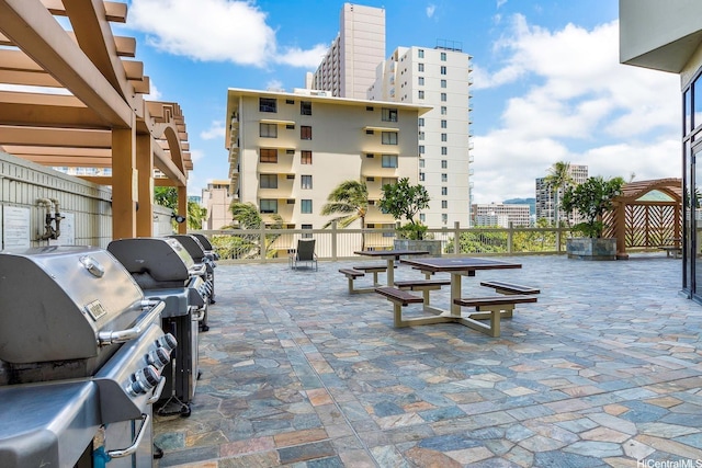 445 Seaside Ave Unit 1602, Honolulu, HI 96815 - view of community featuring a patio area and a city view