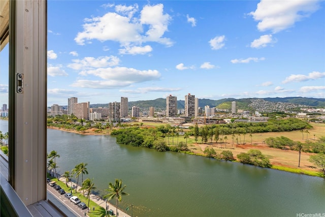 445 Seaside Ave Unit 1602, Honolulu, HI 96815 - water view with nearby urban area and a mountainous background