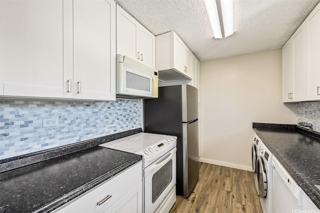 1111 Wilder Ave Pha, Pha, Honolulu, HI 96822 - kitchen featuring white appliances, light wood-type flooring, white cabinetry, tasteful backsplash, and a textured ceiling