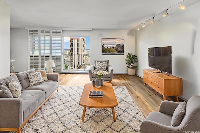 1111 Wilder Ave Pha, Pha, Honolulu, HI 96822 - living area featuring track lighting and wood finished floors