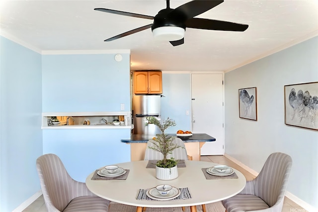 95-2057 Waikalani Pl Unit C403, Mililani, HI 96789 - dining space featuring ceiling fan, crown molding, and light tile patterned flooring