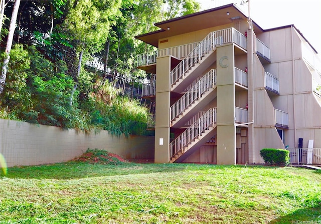 95-2057 Waikalani Pl Unit C403, Mililani, HI 96789 - view of apartment building / complex featuring stairway