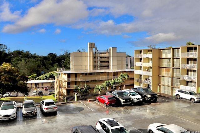 95-2057 Waikalani Pl Unit C403, Mililani, HI 96789 - view of apartment building / complex with uncovered parking