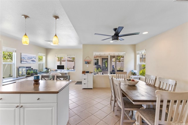 91-6438 Kapolei Pkwy, Ewa Beach, HI 96706 - kitchen with white cabinetry, light tile patterned floors, ceiling fan, decorative light fixtures, and an office area