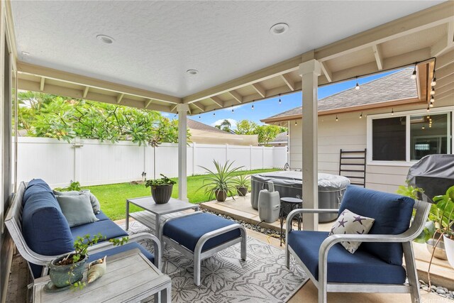 91-6438 Kapolei Pkwy, Ewa Beach, HI 96706 - fenced backyard featuring a hot tub, a patio area, an outdoor hangout area, and grilling area