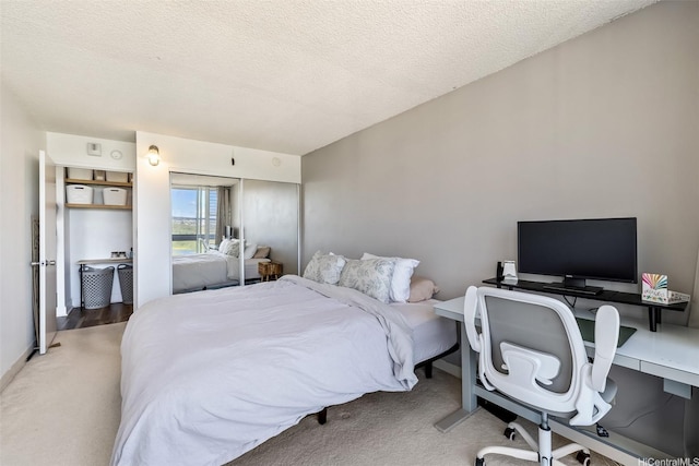 3045 Ala Napuaa Pl Unit 1803, Honolulu, HI 96818 - bedroom with light carpet, a desk, and a textured ceiling