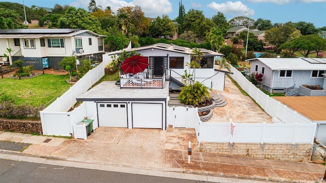 92-759 Lihau St, Kapolei, HI 96707 - view of front of home with a gate, a fenced backyard, a garage, and driveway