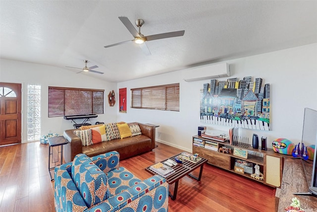 92-759 Lihau St, Kapolei, HI 96707 - living area featuring an AC wall unit, lofted ceiling, a ceiling fan, and wood finished floors