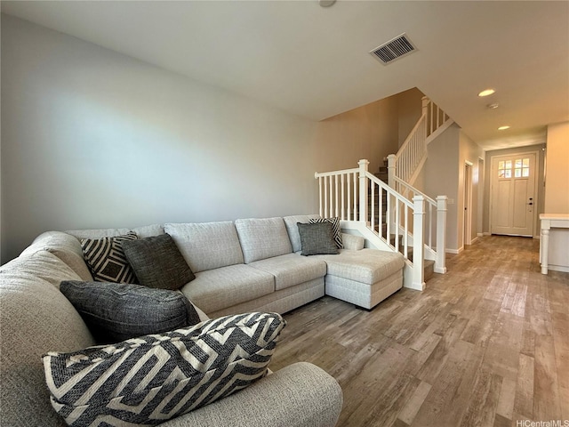 91-2220 Kaiwawalo St Unit 11-1105, Ewa Beach, HI 96706 - living room featuring stairway, wood finished floors, and recessed lighting