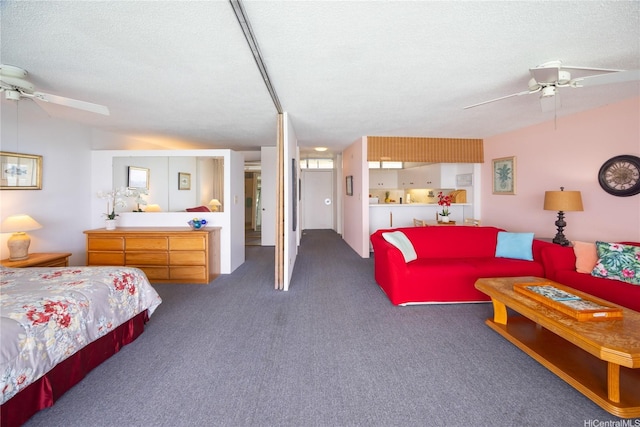 2877 Kalakaua Ave Unit 804, Honolulu, HI 96815 - carpeted bedroom with a textured ceiling and ceiling fan