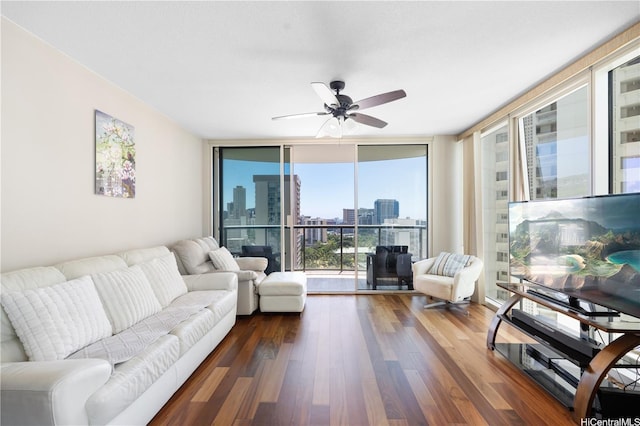1837 Kalakaua Ave Unit 2001, Honolulu, HI 96815 - living room featuring expansive windows, dark wood-style flooring, and ceiling fan