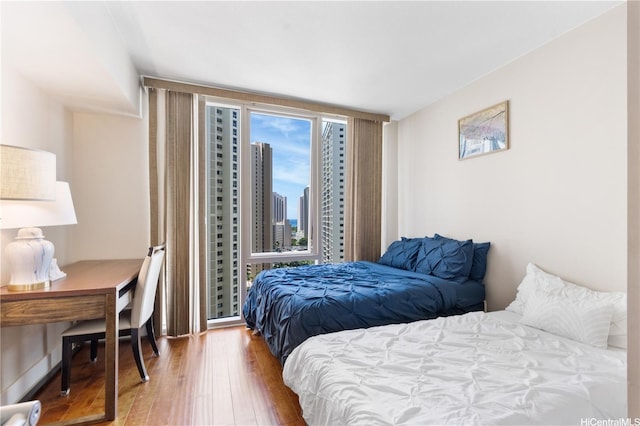 1837 Kalakaua Ave Unit 2001, Honolulu, HI 96815 - bedroom with wood finished floors