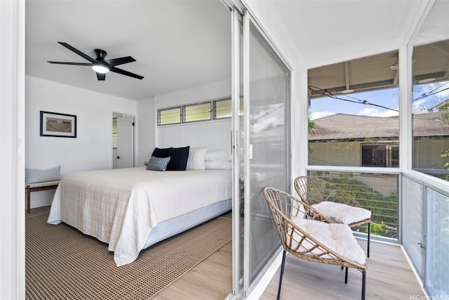1076 Ilima Dr Unit A, Honolulu, HI 96817 - bedroom with multiple windows, wood finished floors, and a ceiling fan