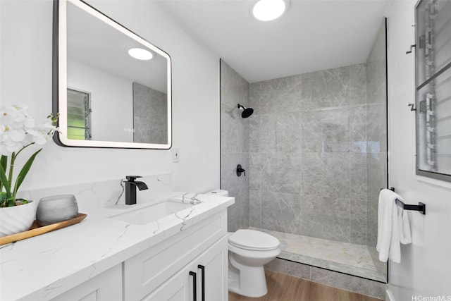 1076 Ilima Dr Unit A, Honolulu, HI 96817 - bathroom with vanity, wood finished floors, and a tile shower