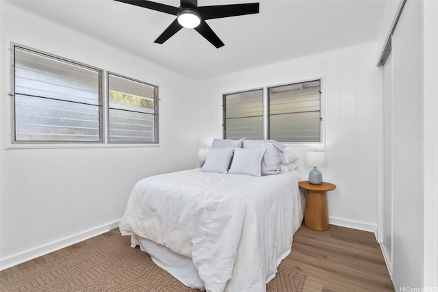 1076 Ilima Dr Unit A, Honolulu, HI 96817 - bedroom with wood finished floors and ceiling fan