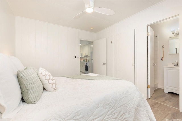 1808 Waiola St Unit 6, Honolulu, HI 96826 - bedroom featuring washer / dryer, wood finished floors, and ceiling fan