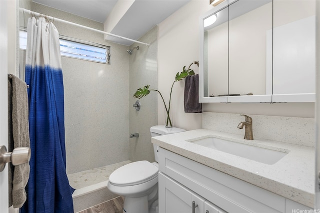 731 Amana St Unit 703, Honolulu, HI 96814 - bathroom with vanity, curtained shower, and wood finished floors