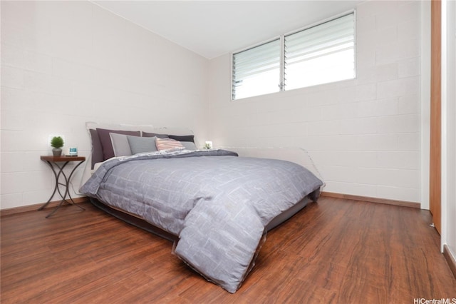 715 Umi St Unit 2B, Honolulu, HI 96819 - bedroom with wood finished floors and baseboards
