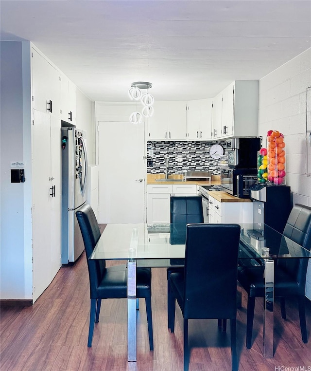 715 Umi St Unit 2B, Honolulu, HI 96819 - dining area with dark wood-style floors