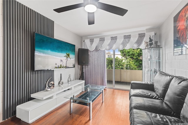 715 Umi St Unit 2B, Honolulu, HI 96819 - living area featuring wood finished floors and ceiling fan