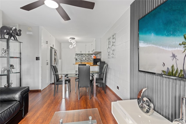 715 Umi St Unit 2B, Honolulu, HI 96819 - dining area with dark wood-type flooring and a ceiling fan