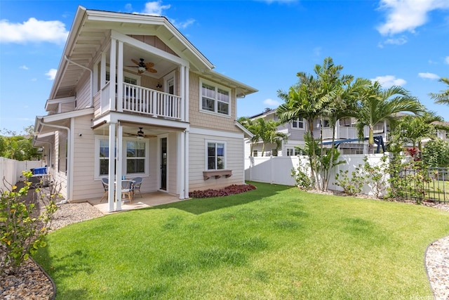 91-1112 Kai Oio St, Ewa Beach, HI 96706 - rear view of property with a ceiling fan, a balcony, and a fenced backyard