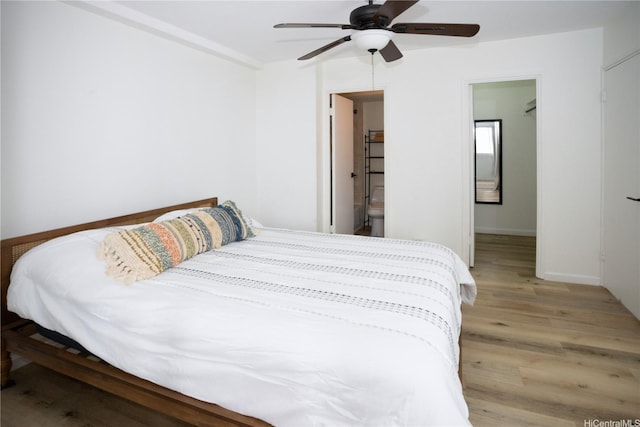 1617 Clark St Unit 404, Honolulu, HI 96822 - bedroom featuring light wood-style flooring and a ceiling fan
