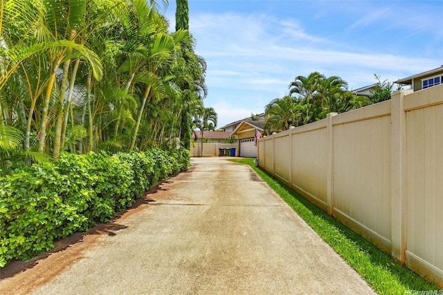 91-1032 Kauoha St, Ewa Beach, HI 96706 - view of yard featuring a garage