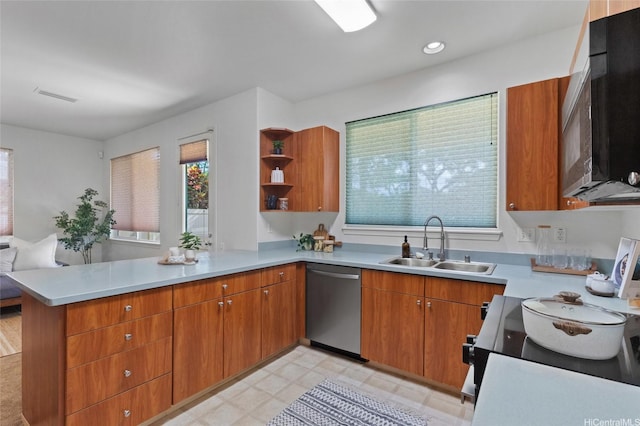 91-1032 Kauoha St, Ewa Beach, HI 96706 - kitchen featuring stainless steel dishwasher, a peninsula, brown cabinets, light countertops, and black microwave
