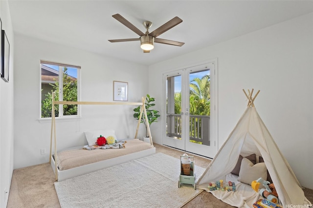91-1032 Kauoha St, Ewa Beach, HI 96706 - carpeted bedroom with access to outside, french doors, and ceiling fan