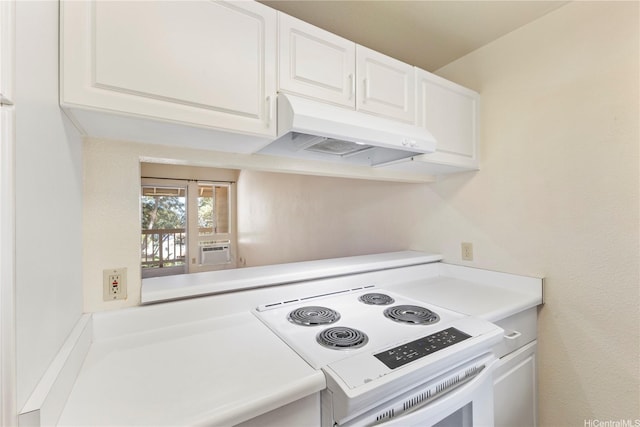 92-1155 Palahia St Unit A205, Kapolei, HI 96707 - kitchen with white range with electric stovetop, under cabinet range hood, white cabinets, and light countertops