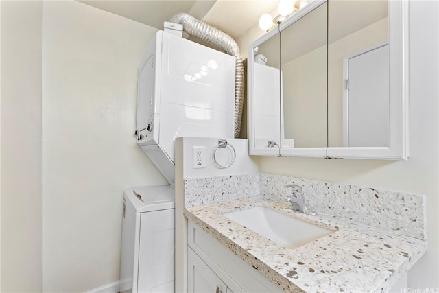 1060 Kamehameha Hwy Unit 801A, Pearl City, HI 96782 - bathroom with stacked washing machine and dryer and vanity