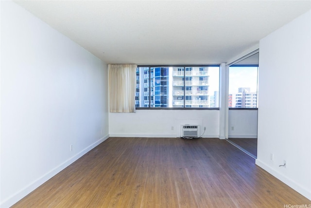 1255 Nuuanu Ave Unit E2804, Honolulu, HI 96817 - empty room featuring dark wood finished floors and baseboards