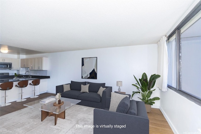 1255 Nuuanu Ave Unit E2804, Honolulu, HI 96817 - living area with wood finished floors and baseboards